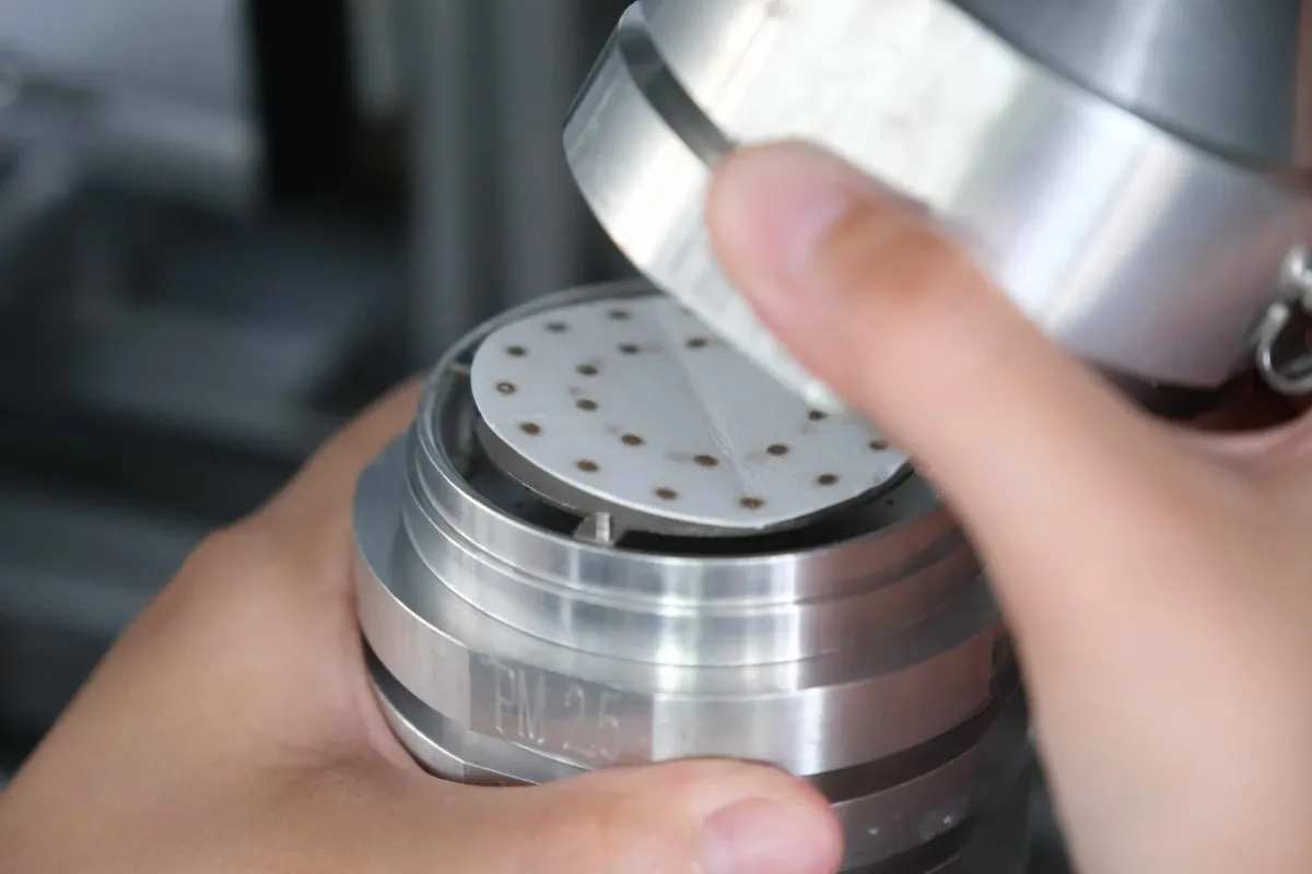 NanoSampler: A miniature dust sampling device, a hope for solving Particulate Matter issues in Thailand